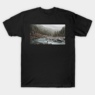 A man standing on jagged rocks in a fast-flowing river in the wilderness T-Shirt